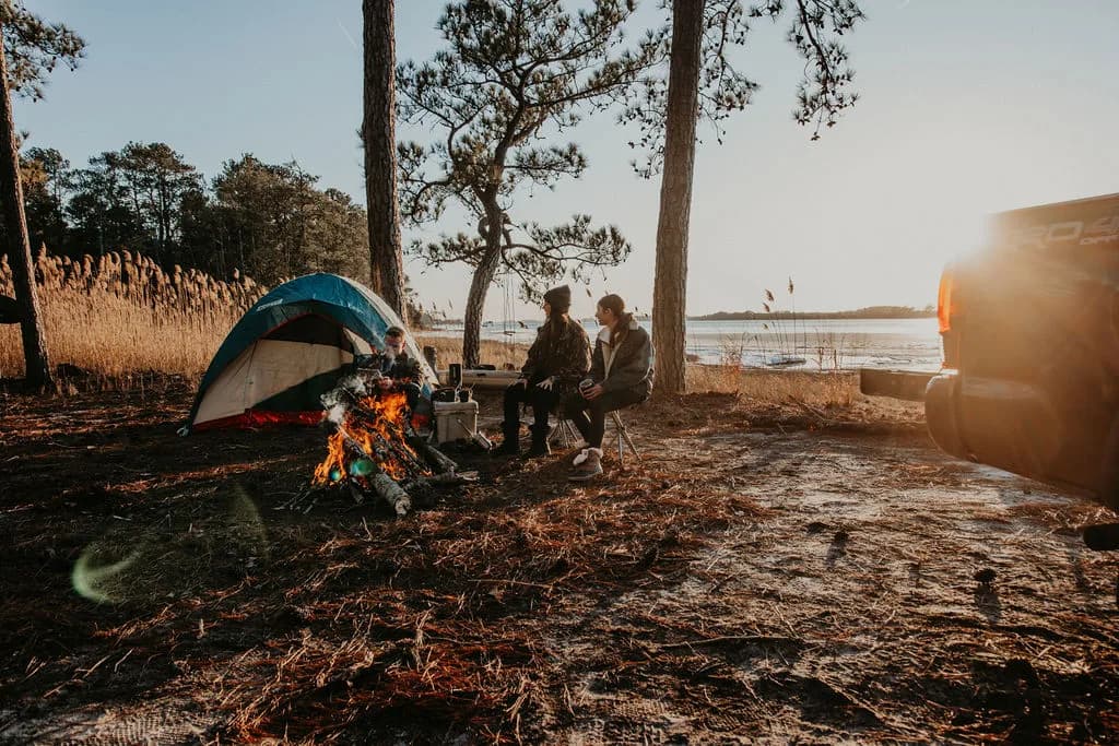 Wide sunset camp on the shoreline